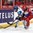 KANATA, CANADA - APRIL 9: Finland's Karoliina Rantamaki #29 and Russia's Inna Dyubanok #27 battles for the puck during bronze medal round action at the 2013 IIHF Ice Hockey Women's World Championship. (Photo by Jana Chytilova/HHOF-IIHF Images)